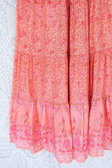 detail contrast indian style block printed hemline and tiered cut on peacock prairie bohemian maxi skirt in peachy rose pink rayon by all about audrey