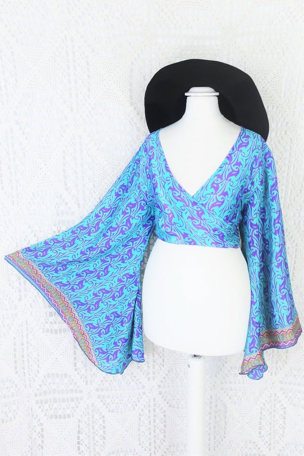 light turquoise blue and lilac purple block print vingage sari boho gemini bell sleeve wrap top photographed on a uk size 8 mannequin by all about audrey