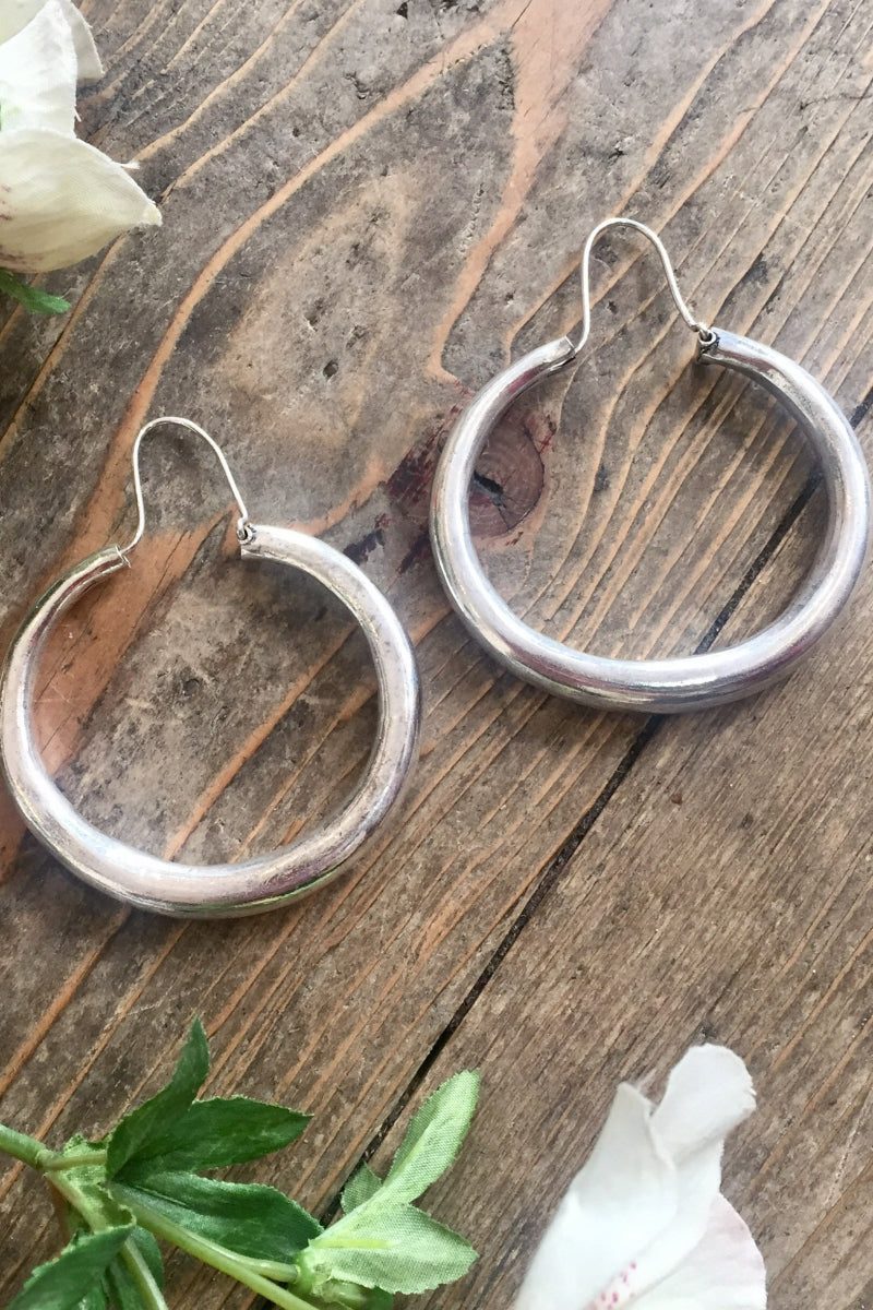 laid flat large silver painted hoop earrings from our boho jewellery collection at all about audrey