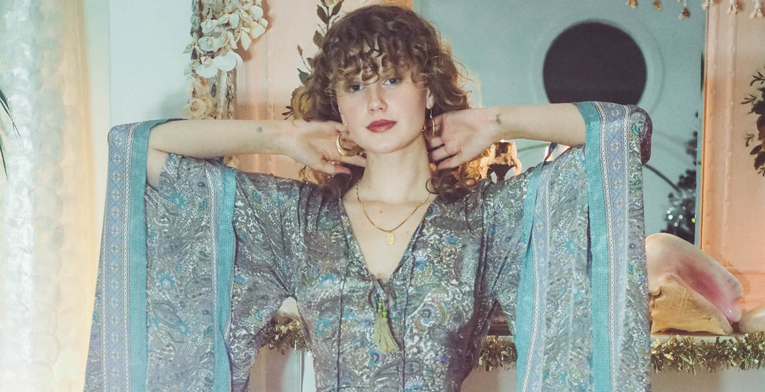 model wears cassidy maxi dress in mirage blue from vintage inspired bohemian clothing fashion collection by all about audrey
