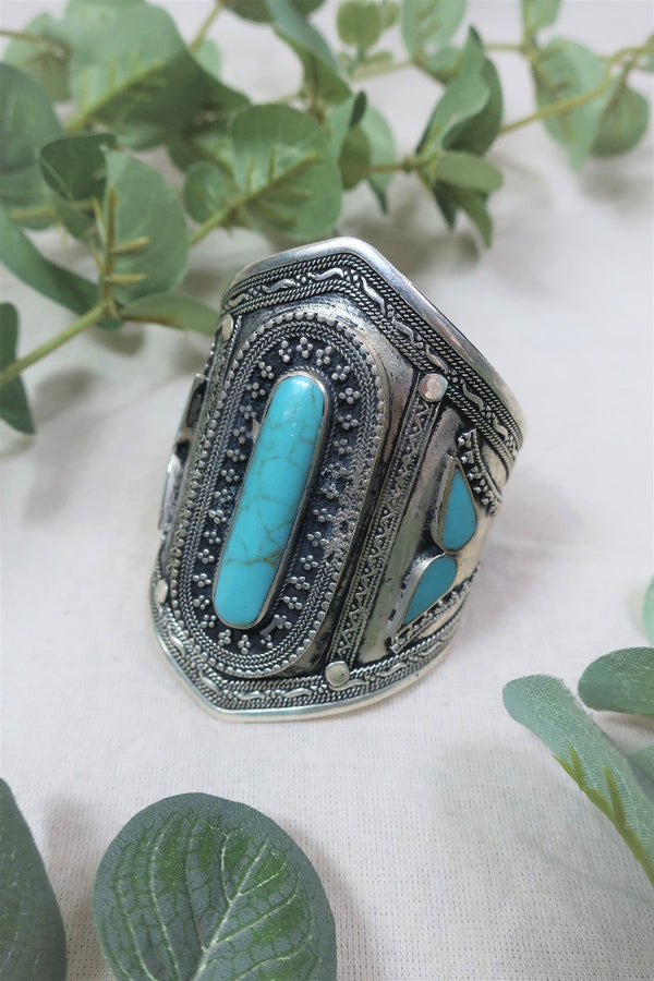 Silver Plated Brass and Reconstituted Turquoise Seven Stone Turkish Bangle