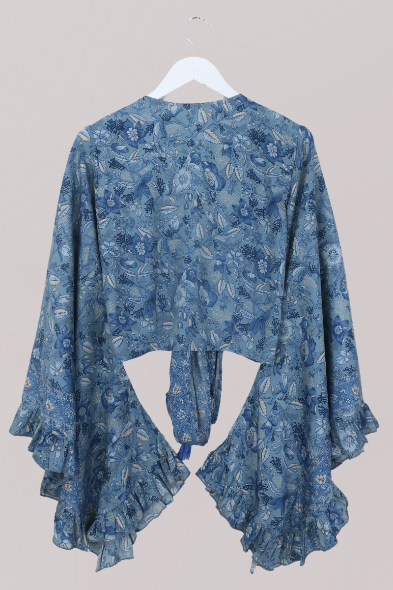 Venus Folklore Floral Wrap Top in Forget Me Not Blue by All About Audrey