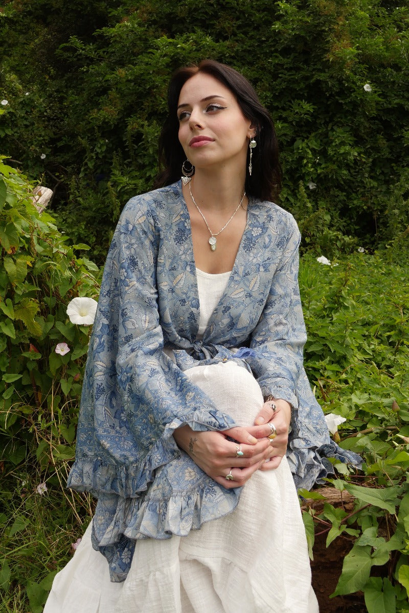 Venus Folklore Floral Wrap Top in Forget Me Not Blue by All About Audrey