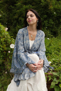 Venus Folklore Floral Wrap Top in Forget Me Not Blue by All About Audrey