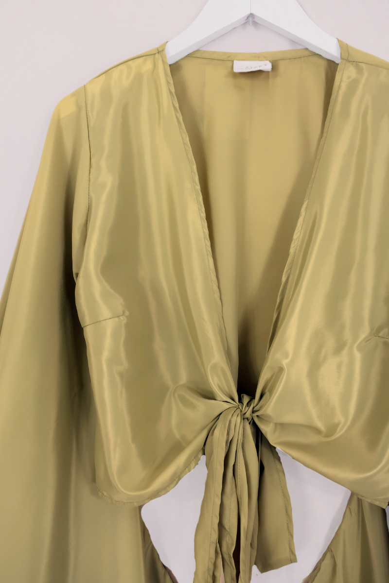 Khroma Venus Wrap Top in Caterpillar Green by All About Audrey
