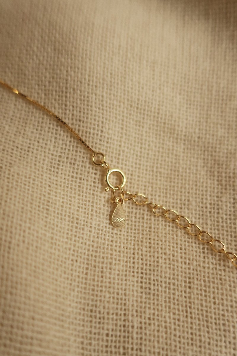 Gold Misty Mountain Charm Necklace by All About Audrey