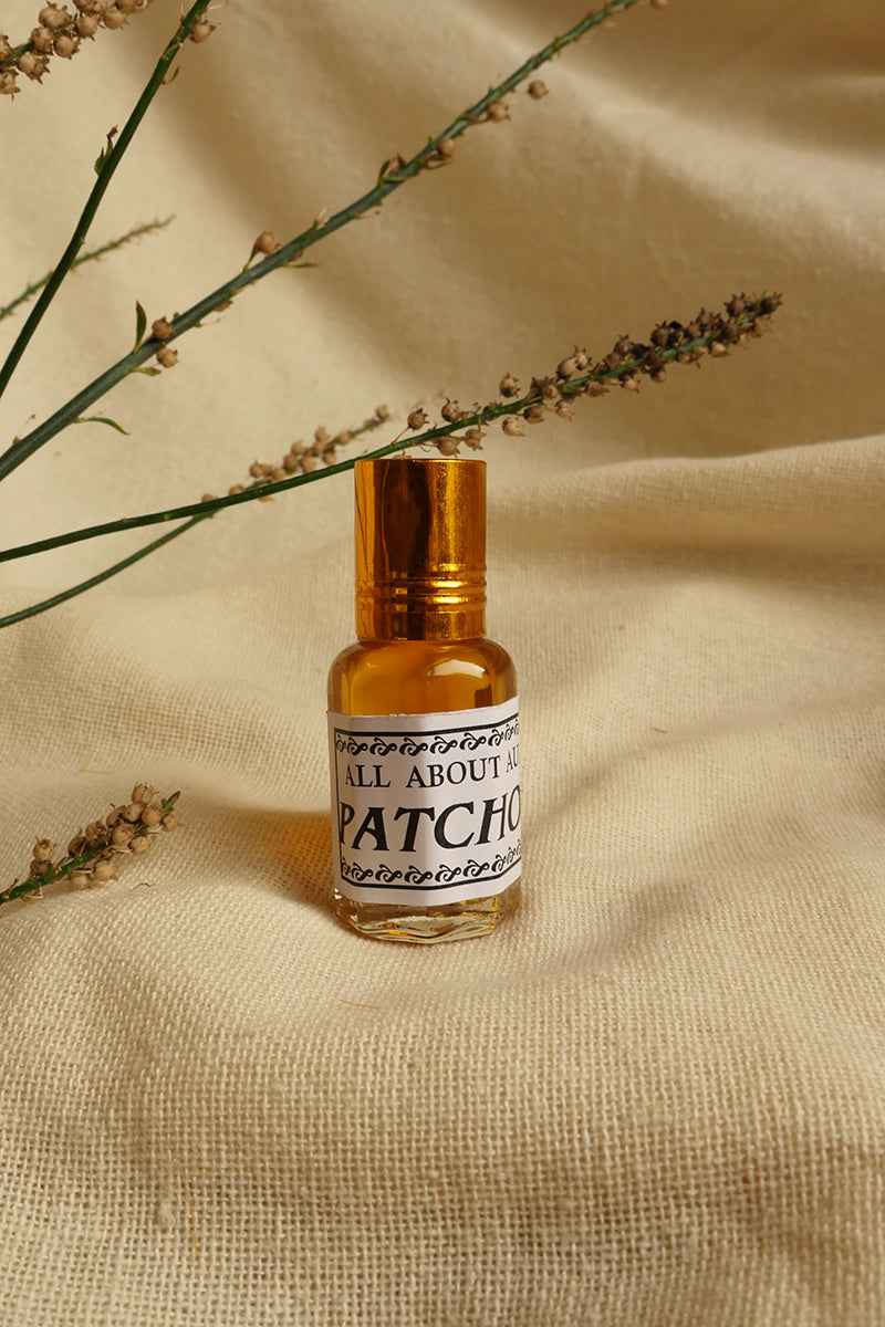 Patchouli Essential Oil Perfume, a small glass bottle with a vintage style metal screw top. By All About Audrey