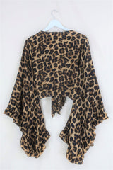 A wild twist on our staple Venus wrap top! This Savanna Leopard print will always be timeless! A bold, all over animal pattern in sandy gold, brown and black tones. And of course our signature frill bell sleeves - it's combining a little bit of drama with an easy to wear print! By All About Audrey