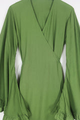 Flat lay of our Khroma Venus Robe Dress in Pixie Green shown tied at the front in a robe style by All About Audrey