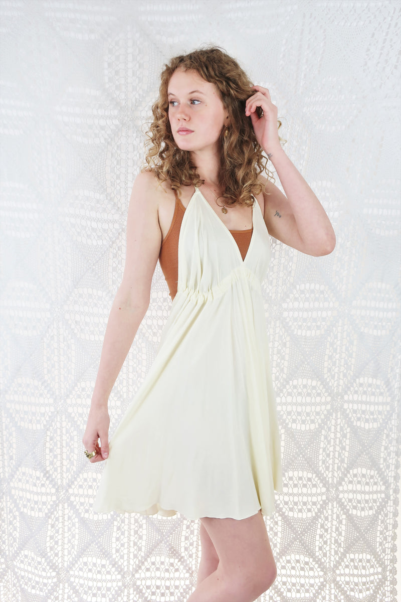 25% OFF Khroma Medusa Mini Halter Dress in Light Cream - Free Size