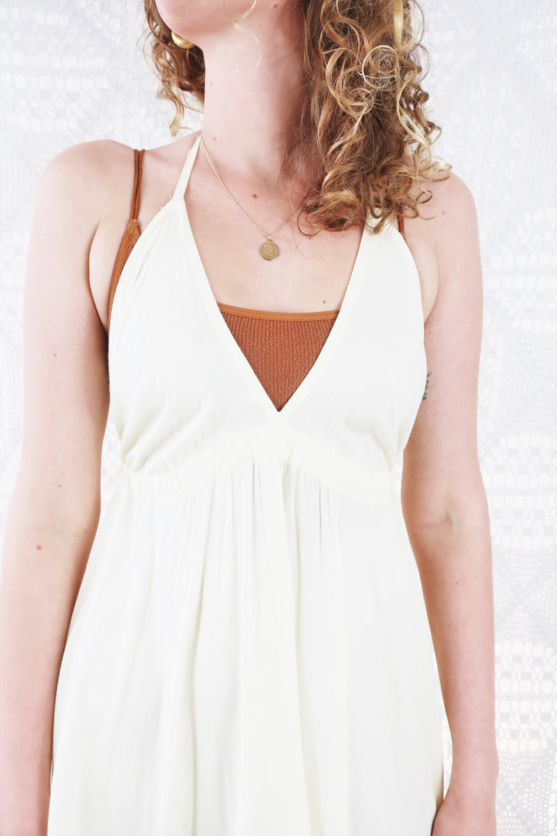 25% OFF Khroma Medusa Mini Halter Dress in Light Cream - Free Size