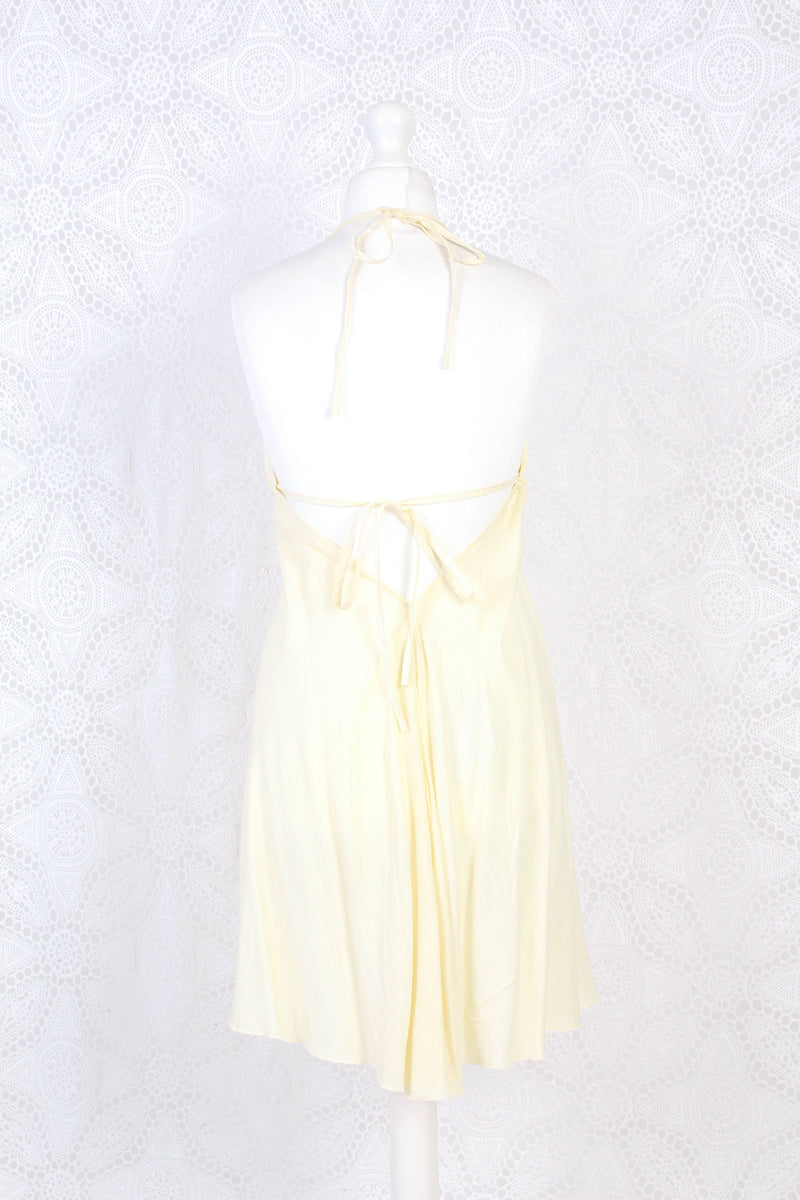 25% OFF Khroma Medusa Mini Halter Dress in Light Cream - Free Size