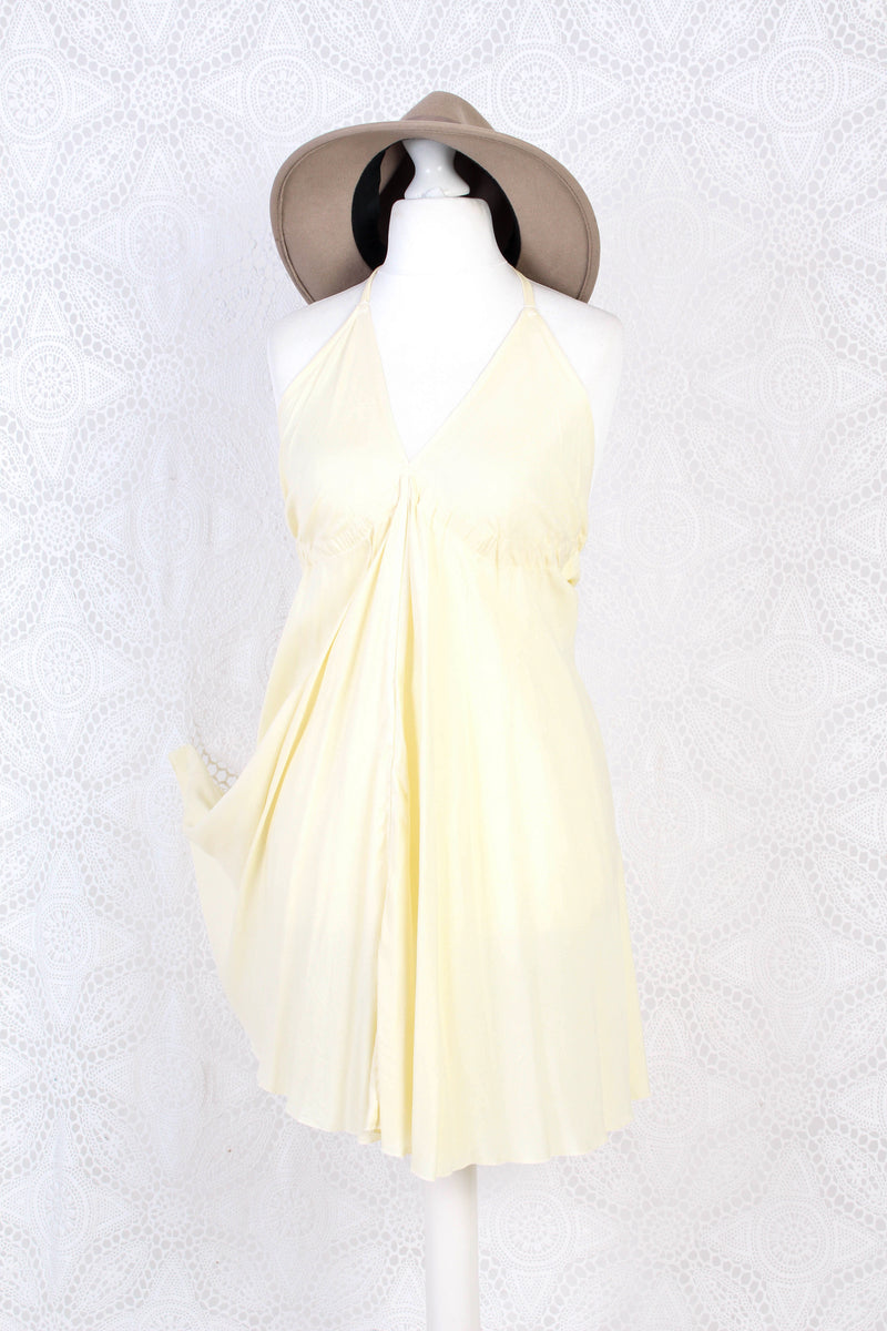 25% OFF Khroma Medusa Mini Halter Dress in Light Cream - Free Size