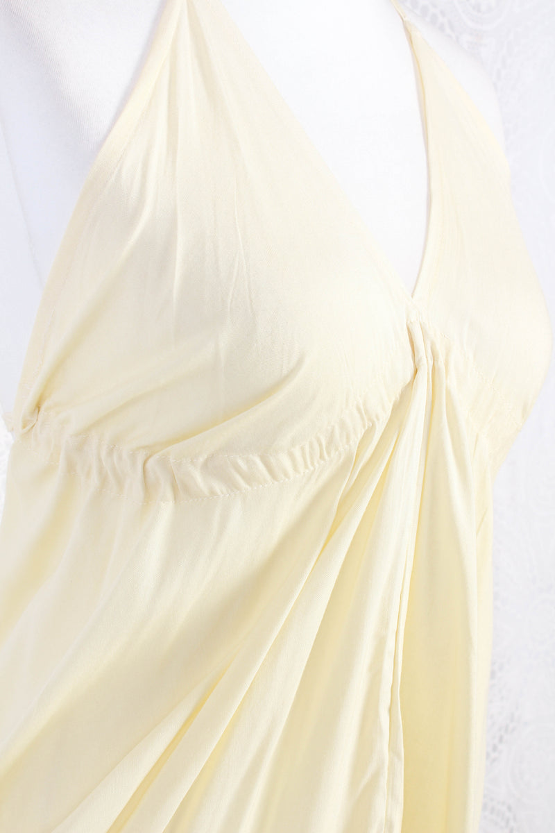 25% OFF Khroma Medusa Mini Halter Dress in Light Cream - Free Size