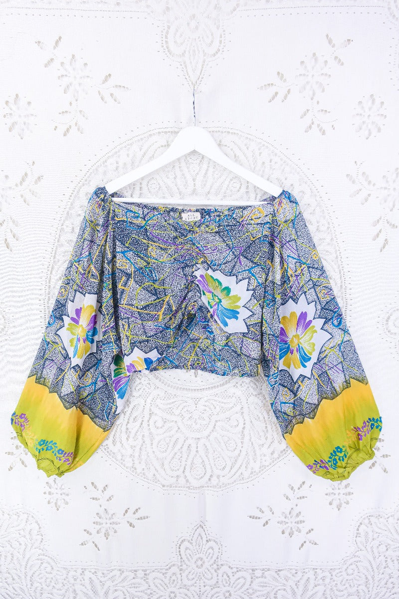 Our gorgeous Ariel top with sweet heart neck line and ruched chest.  tones of slate grey and sunshine yellow.