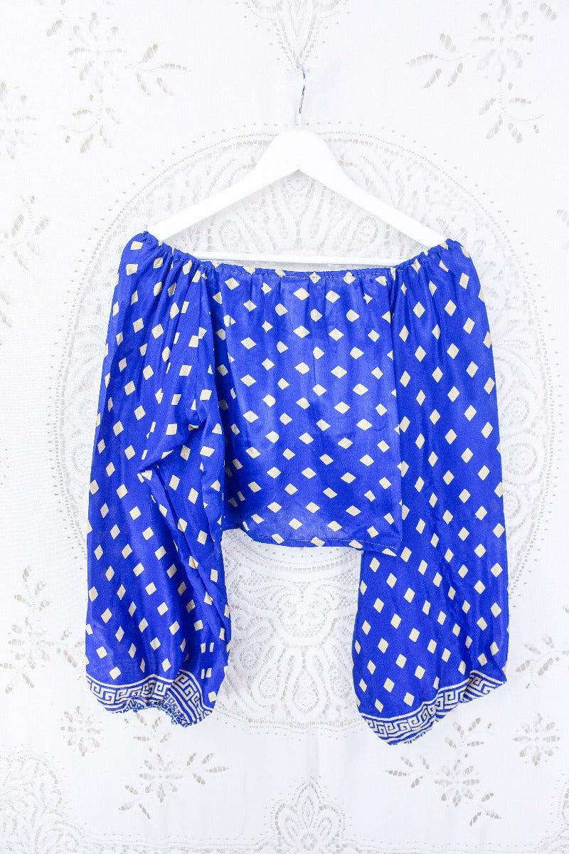 Photo shows back view of the Ariel Top. Our stunning diamond printed Ariel top in shade royal blue. This beauty has a sweetheart neckline and ruched bust. A cropped style.