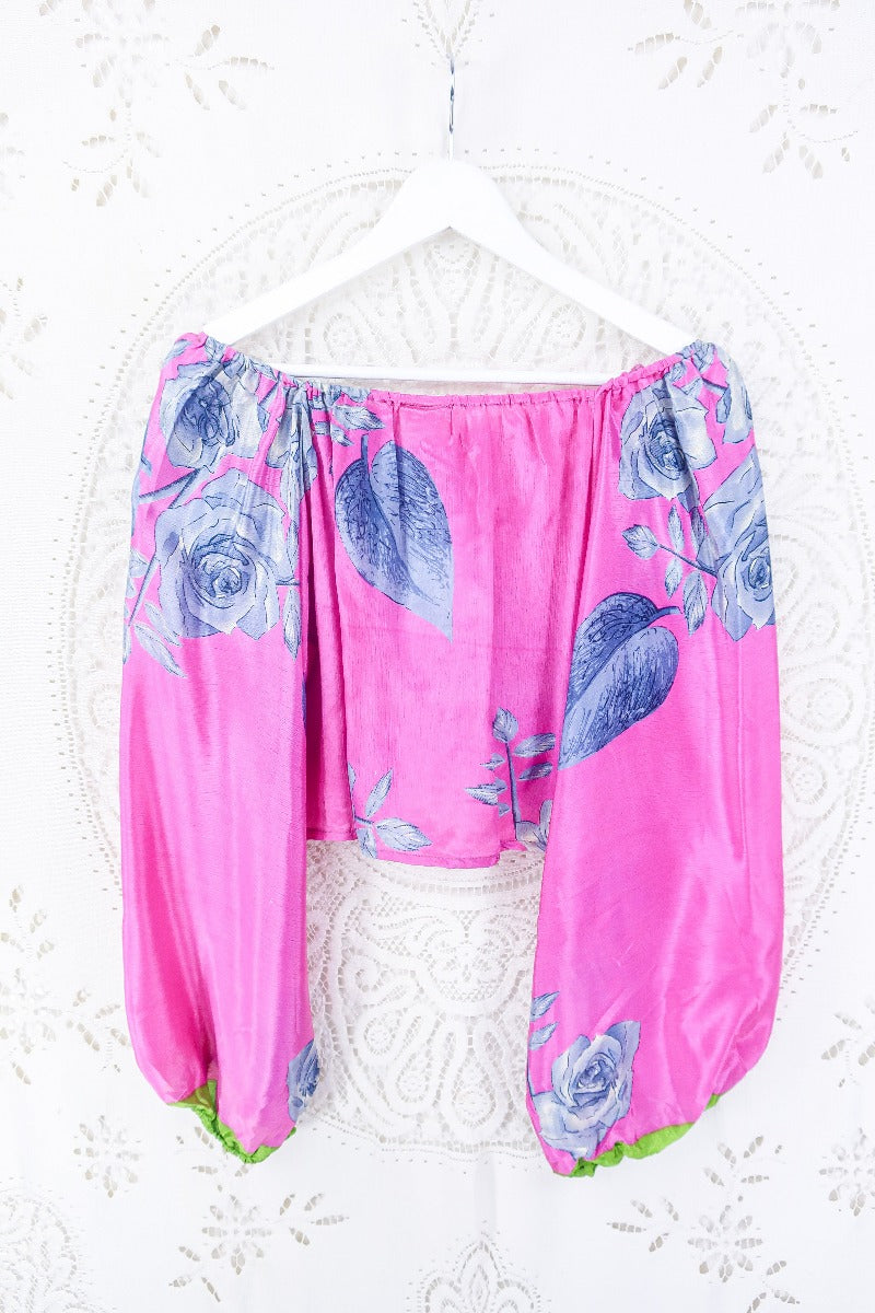 photo shows back view photo of our Ariel top.Our stunning Ariel top with ruched bust and sweet heart neckline. Cropped style. This beauty has shades of slate grey and grass green within a base colour of peony pink. 