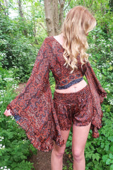 Venus Wrap Top - Rust & Jet Mandala - All Sizes by all about audrey. Model wears our gorgeous Venus wrap top with bell frill sleeves, in Rust & Jet Mandala. This beauty is super versatile and can be worn a variety of ways. Best fit size S/M