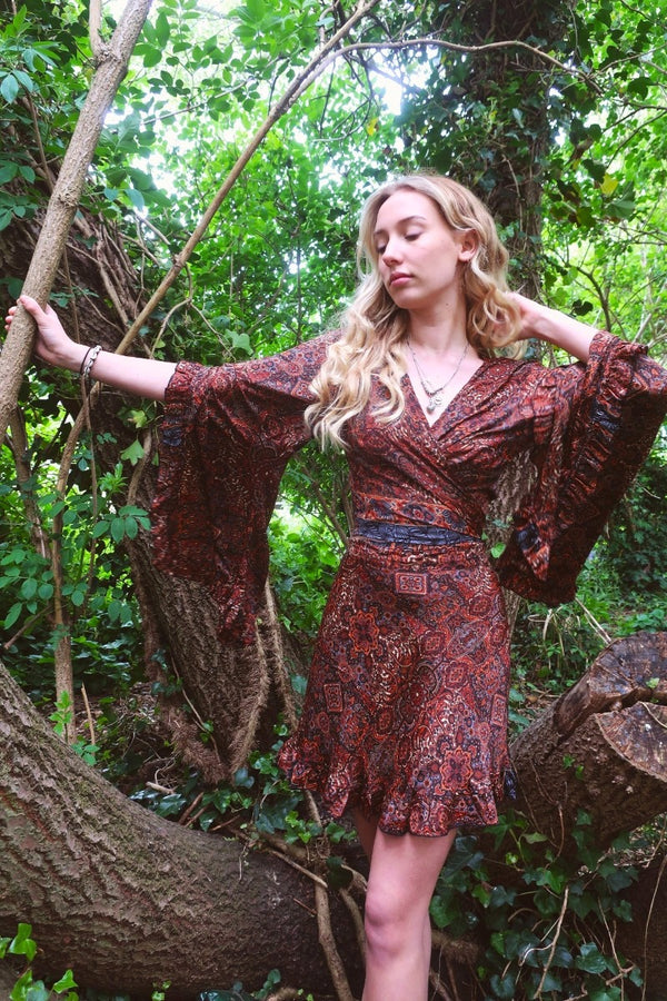 Venus Wrap Top - Rust & Jet Mandala - All Sizes by all about audrey. Model wears our gorgeous Venus wrap top with bell frill sleeves, in Rust & Jet Mandala. This beauty is super versatile and can be worn a variety of ways. Best fit size S/M