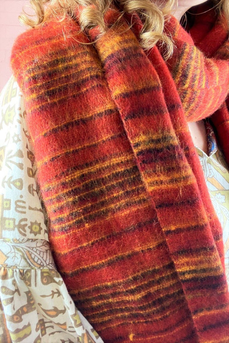 close up of burnt red recycled Indian shawl with black & mustard stripes - All About Audrey