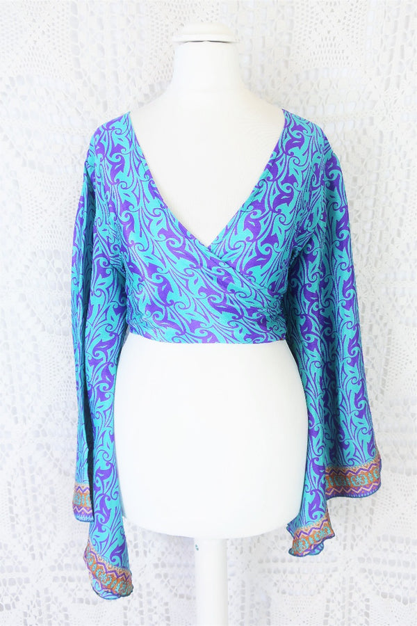 light turquoise blue and lilac purple block print vingage sari boho gemini bell sleeve wrap top photographed on a uk size 8 mannequin by all about audrey