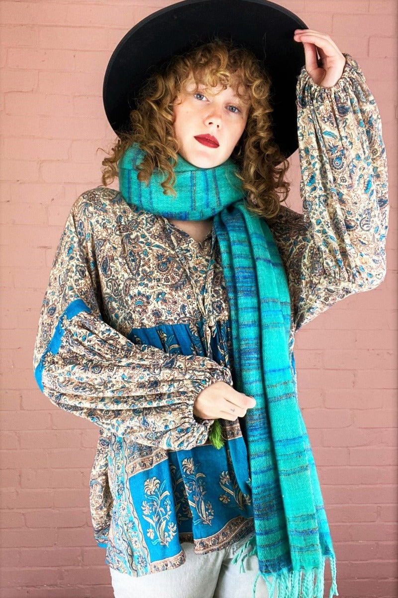 stripy seafoam and blue reversible recycled Indian shawl worn wrapped around model's neck - All About Audrey