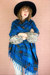 sapphire blue with red & gold stripes recycled Indian shawl drapped over shoulder of model - All About Audrey