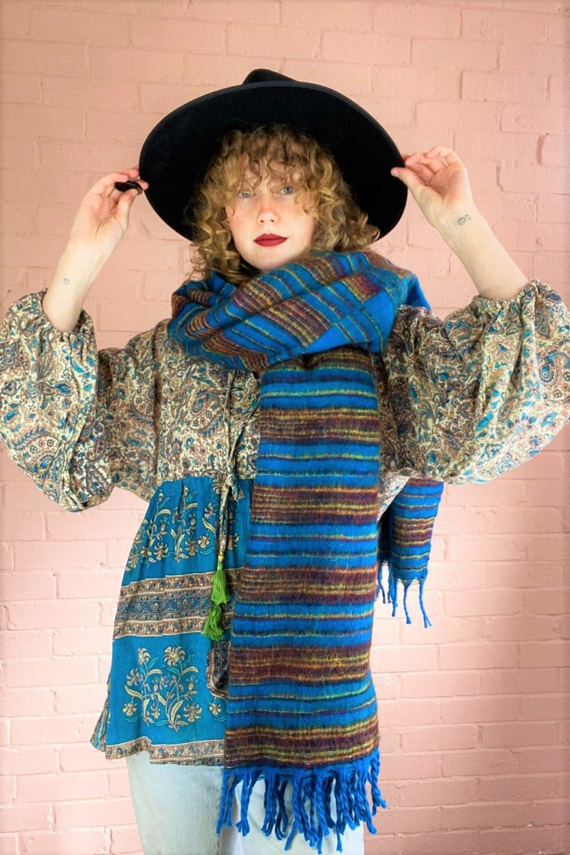 Sapphire, ruby & gold stripy reversible recycled Indian shawl worn wrapped once around model's neck - All About Audrey