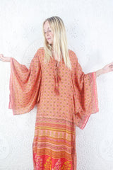 Example of a UK size 10 model wearing a size SM Cassandra boho maxi kaftan dress handmade from recycled 70 vintage Indian sari by All About Audrey