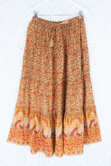 laid flat peacock prairie maxi skirt in tan and turmeric indian style printed sustainable rayon all about audrey
