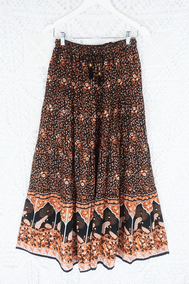 laid flat peacock prairie maxi skirt in indian block printed style sustainable rayon fabric colour jet black and terracotta by all about audrey